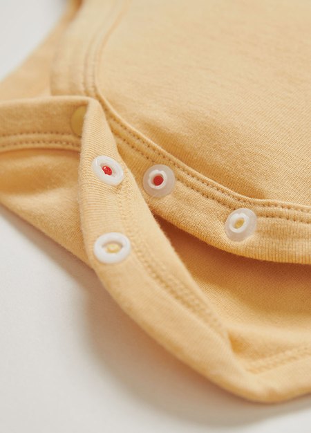 BABY迪士尼蓄熱保溫長袖包屁衣-抱抱龍-黃色3